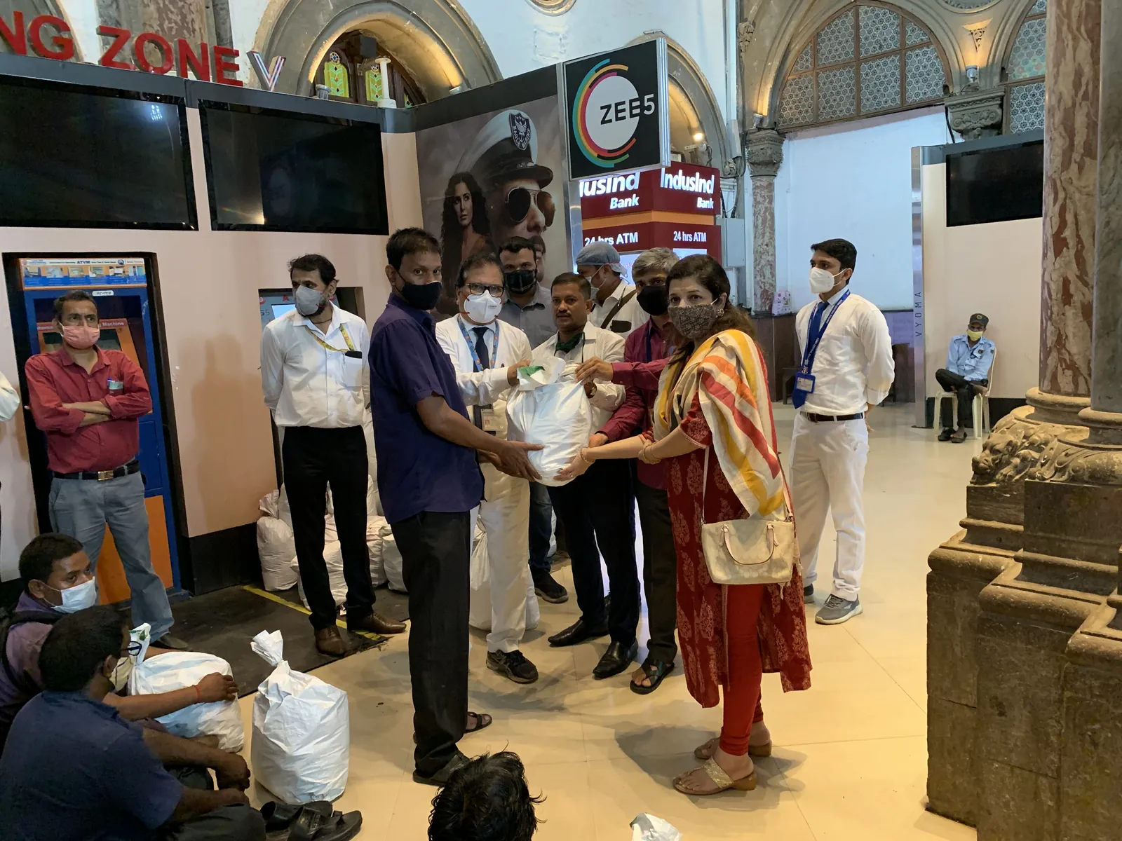 Food donation for shoe polish workers at CST Station